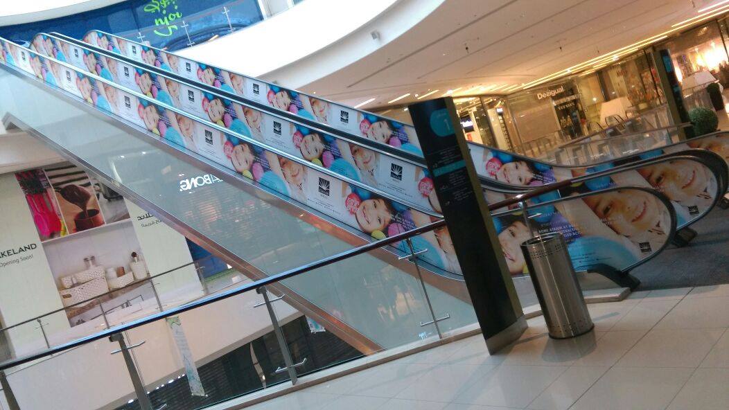 Escalator Branding Marina Mall DSS Promotion Neighbourhood Digital